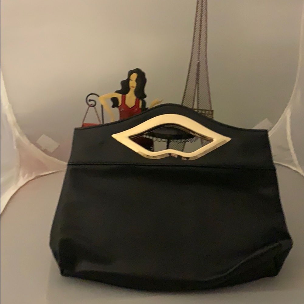 Black and gold clutch bag